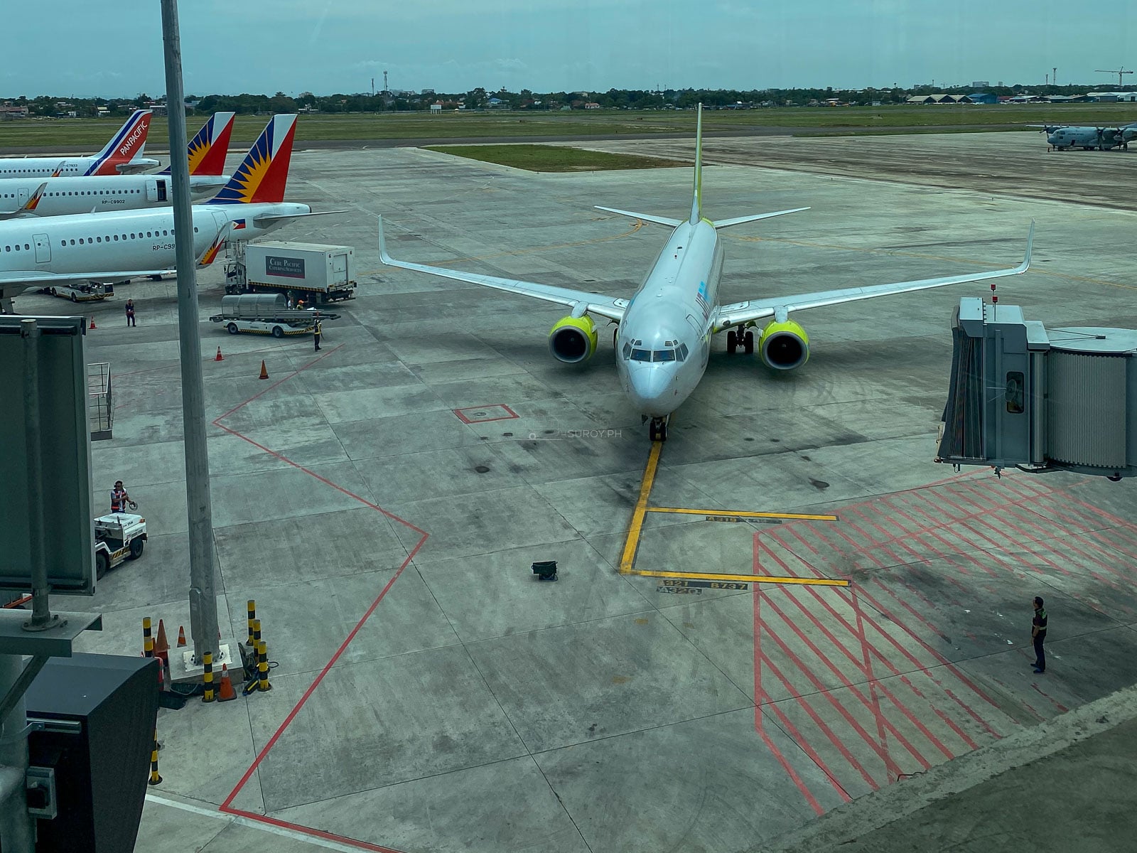 Aircraft parked at a gate at Mactan-Cebu International Airport
