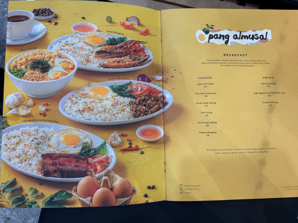 The Manam menu page headed pang almusal showing breakfast plates with rice, eggs and cured meats
