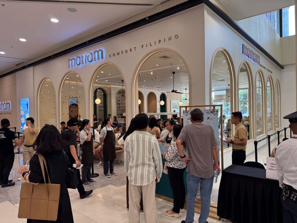 The Manam Comfort Filipino storefront on the Upper Ground of the North Wing at SM City Cebu with a queue of diners outside