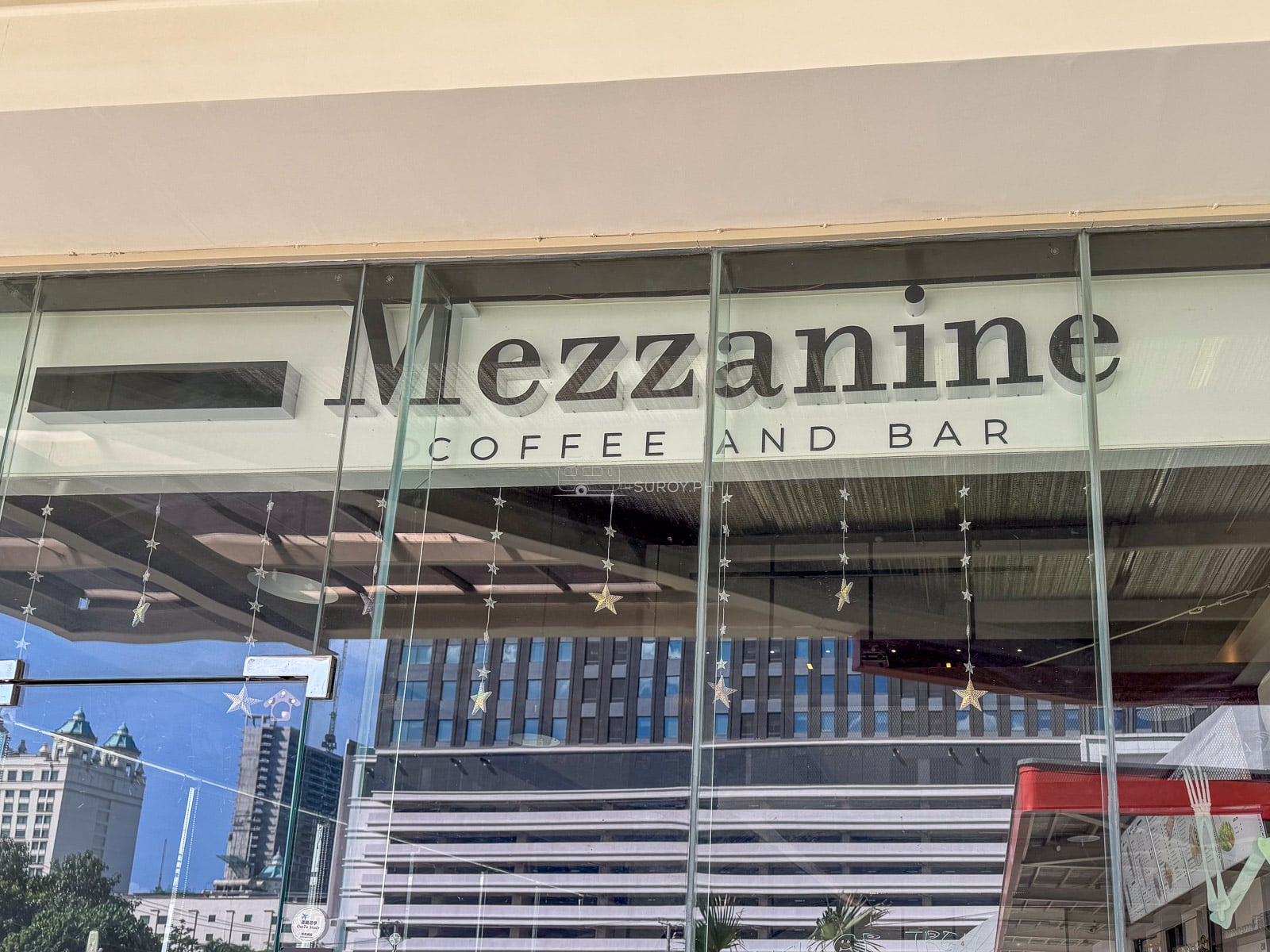 A mezzanine is the floor between two floors. The name is the business plan.