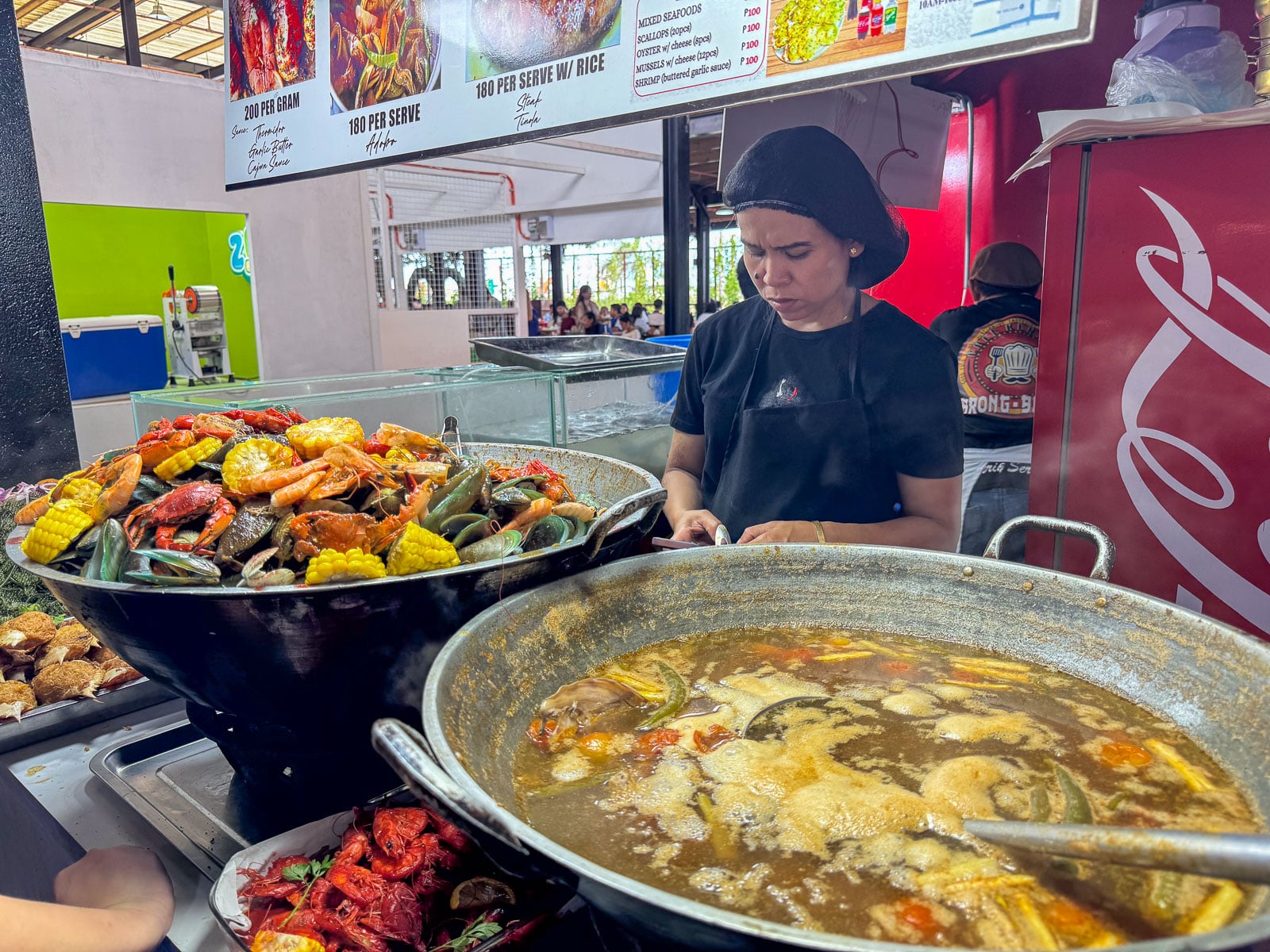 Seafood boil with shrimp, crabs, mussels, and corn at Pusô Village Cebu