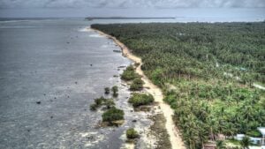 Aerial view of the Siargao coastline near General Luna, shot in January 2018
