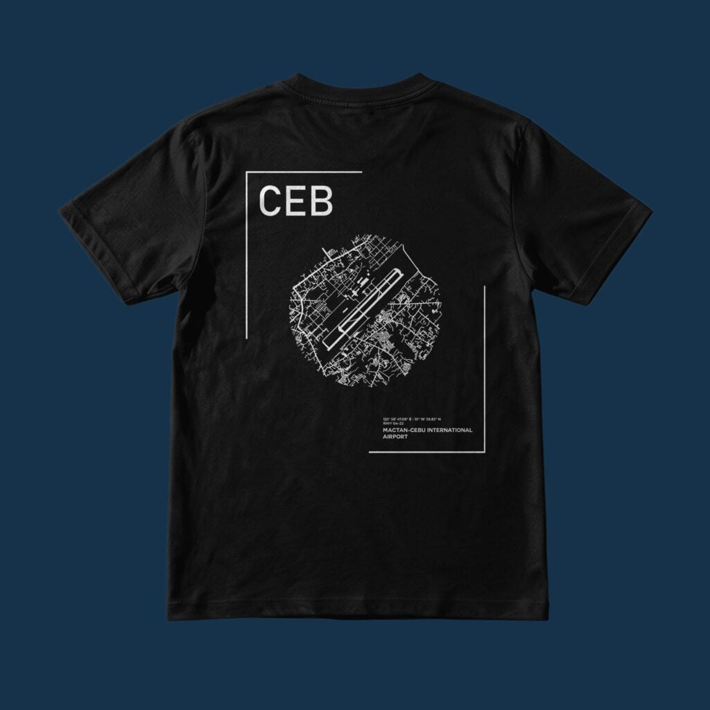 Suroy Wear Airport Series CEB tee in black on a deep navy background, back view, circular Mactan-Cebu airport map with runway 04-22