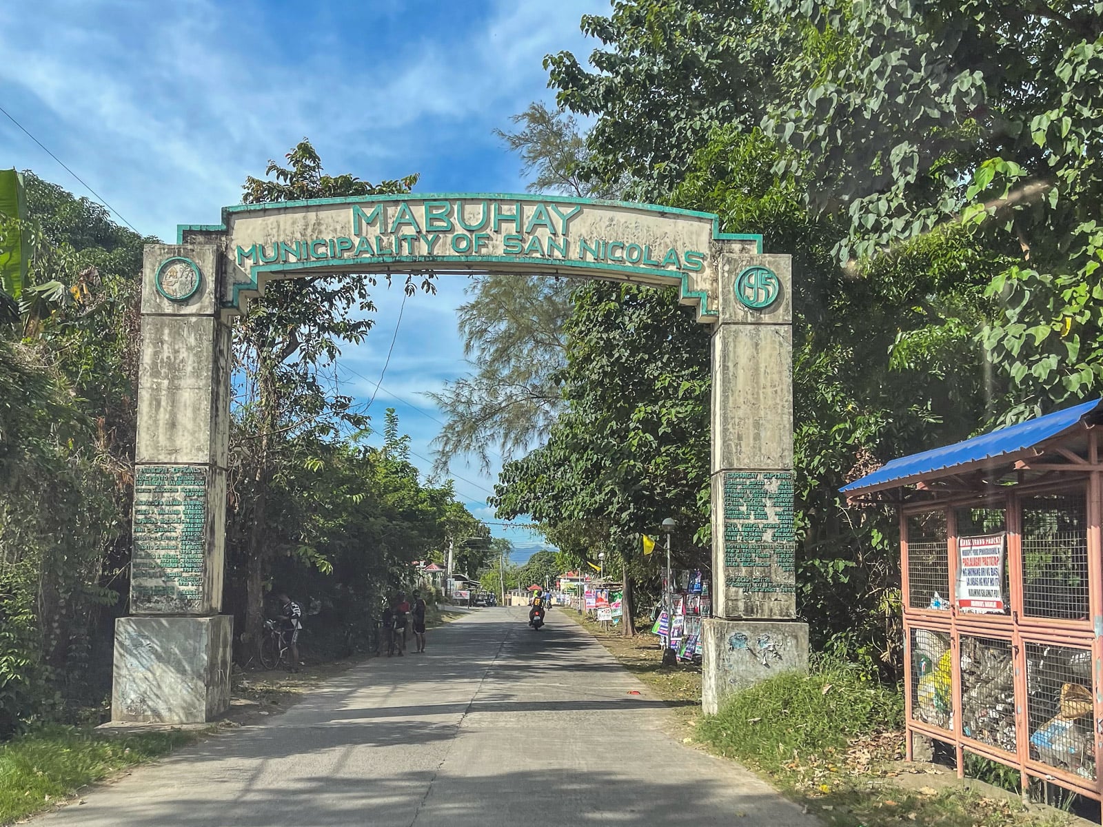Concrete municipal welcome arch reading Mabuhay Municipality of San Nicolas in Batangas