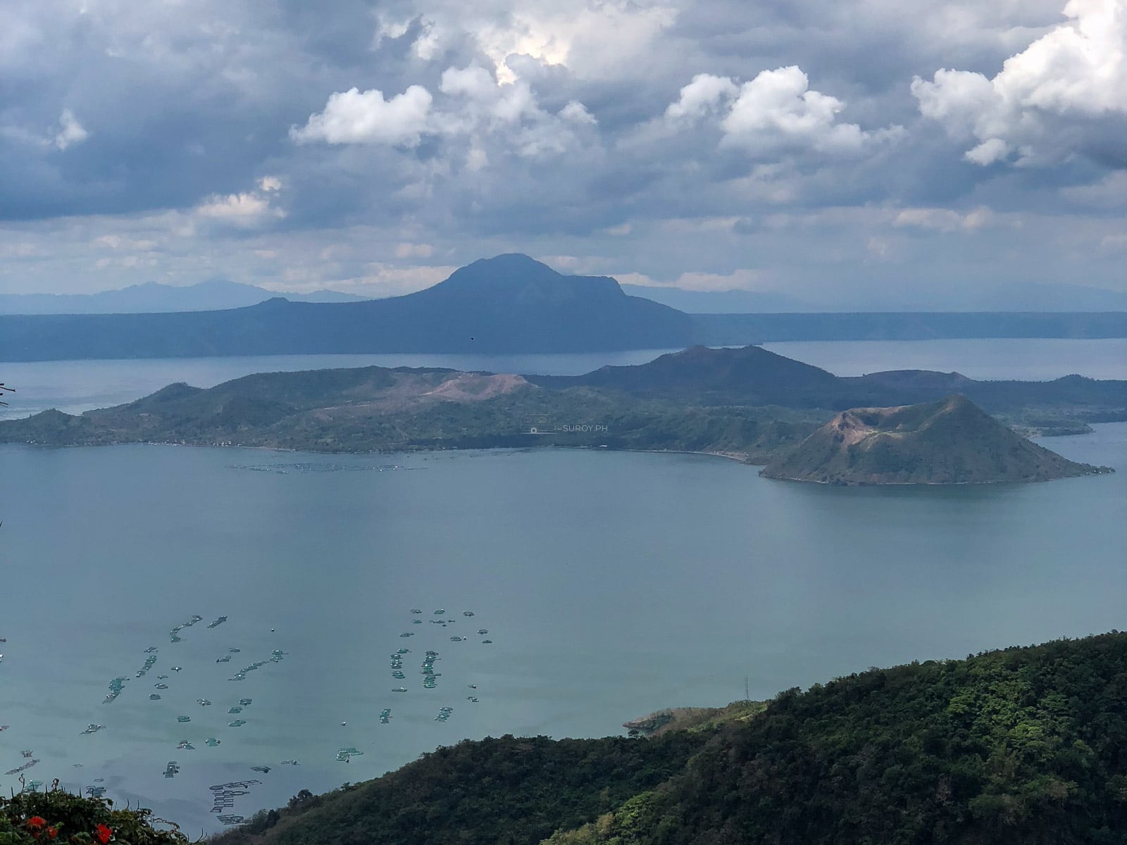 Green vegetated Taal Volcano Island in Taal Lake seen from the Tagaytay ridge in 2018 before the eruption